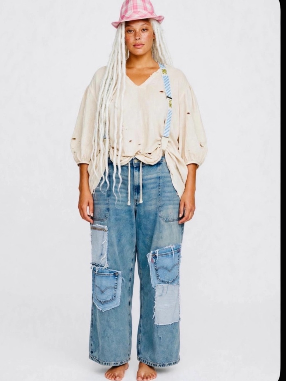 CRAM wide leg jeans with suspenders.